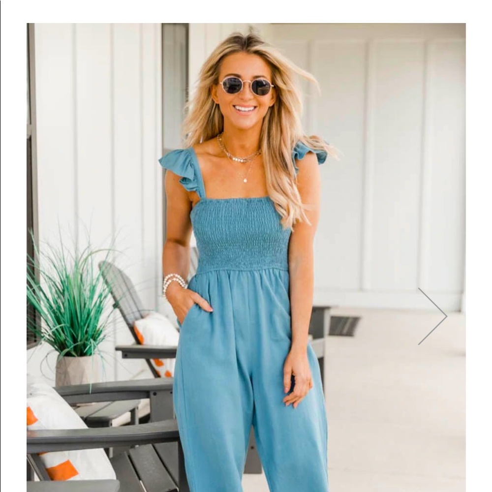 Blue Pants Jumpsuit with ruffled sleeves. Never worn